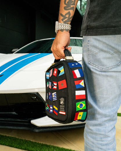 JAMES FIRST CLASS GLOBAL FLAGS SNACKPACK | Sprayground for sale