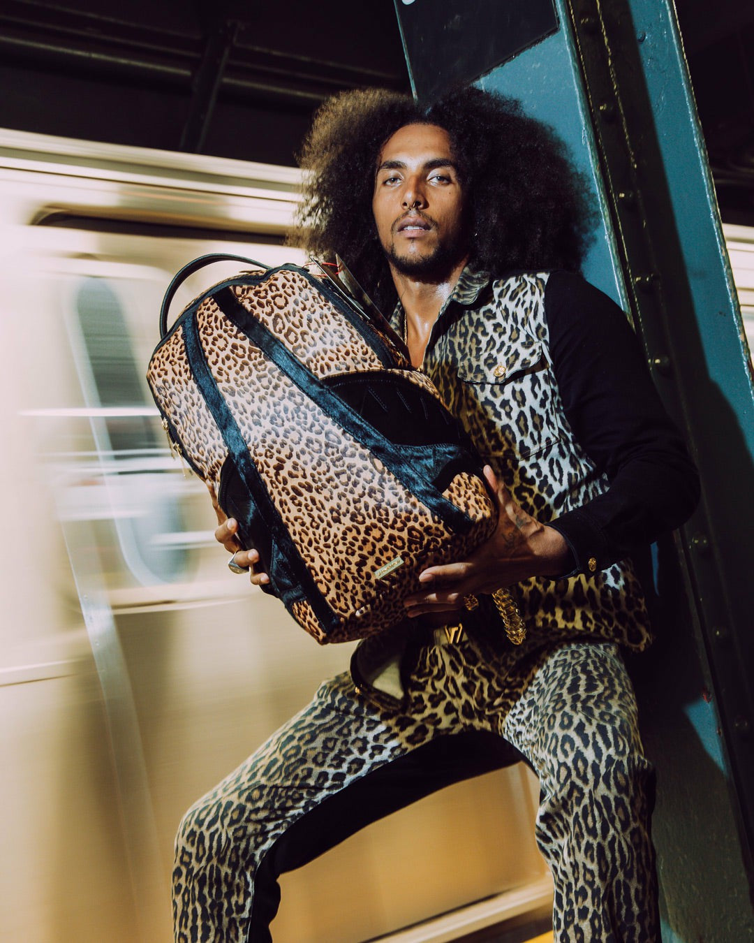 AFRICAN INTELLIGENCE 9 COURAGE LIVES ON BACKPACK - SANDFLOWER COLLAB | Sprayground Online