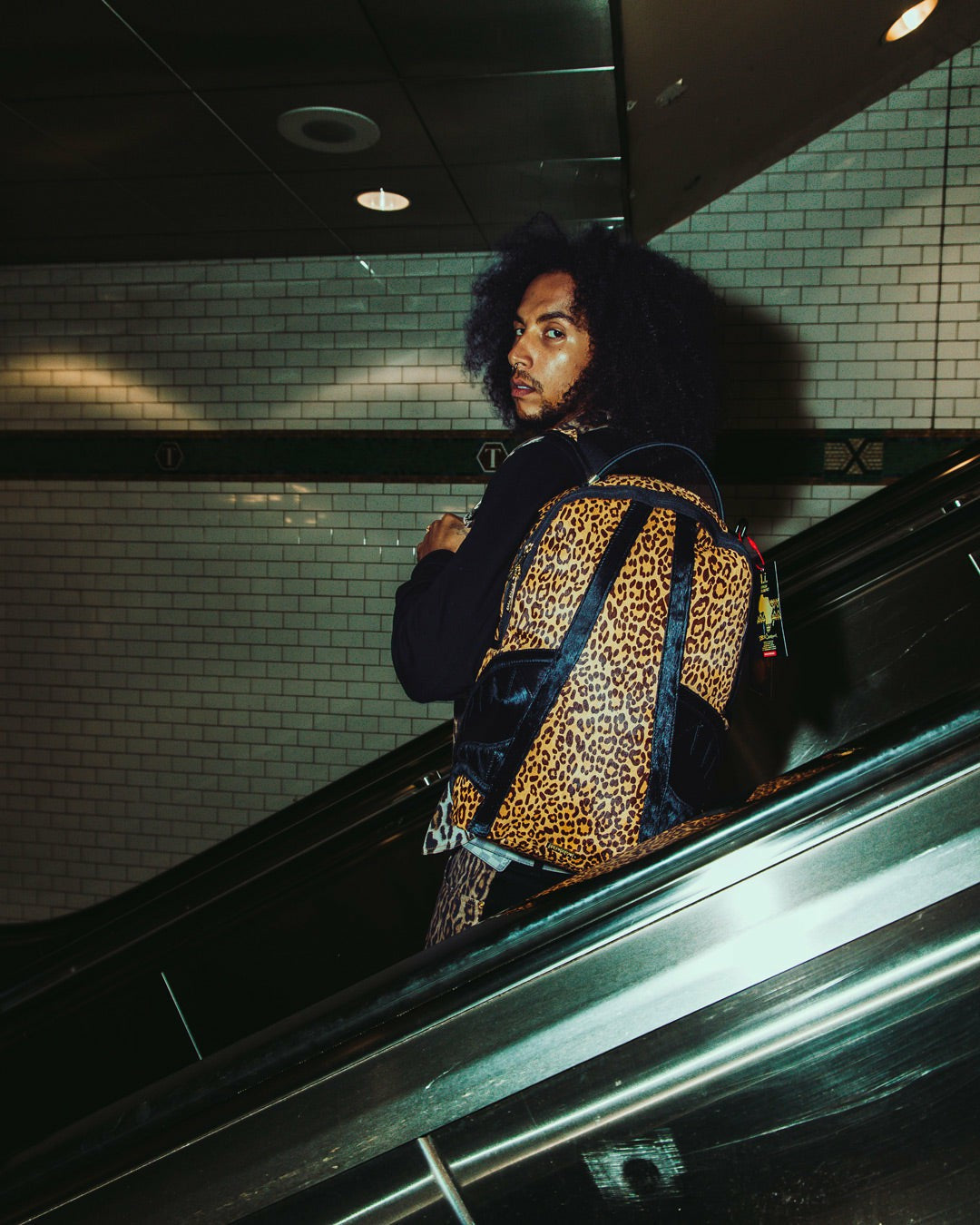 AFRICAN INTELLIGENCE 9 COURAGE LIVES ON BACKPACK - SANDFLOWER COLLAB | Sprayground Online