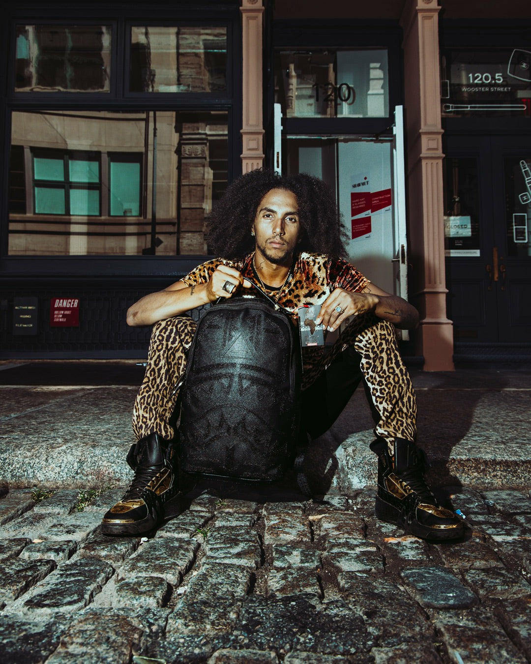 AFRICAN INTELLIGENCE 9 APEX GENIUS BACKPACK - SANDFLOWER COLLAB | Sprayground Near Me