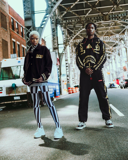 A.I.9 AFRICAN INTELLIGENCE GUILDED LEOPARD - SANDFLOWER COLLAB VARSITY | Sprayground US