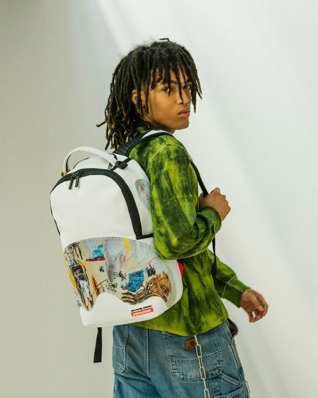 OFFICIAL BASQUIAT ACQUE PERICOLOSE 1981 BACKPACK (DLXV) | Sprayground Clearance