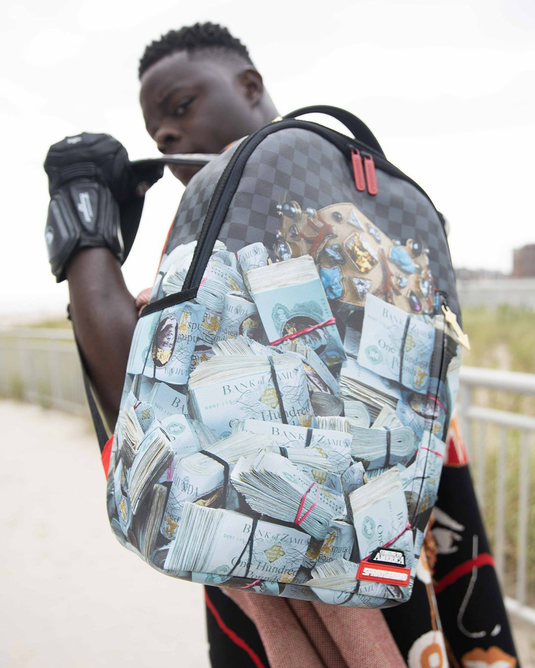 BANK STACKS OF ZAMUNDA COMING 2 AMERICA BACKPACK | Sprayground Near Me