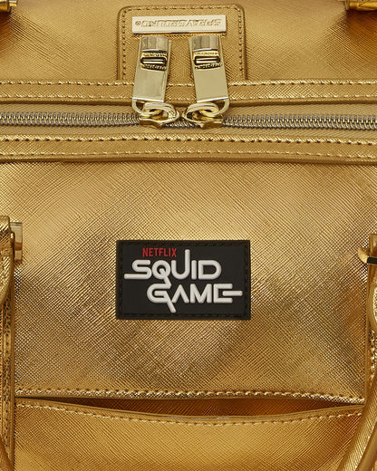 SQUID GAME COLLAB PIGGY BANK DUFFLE | Sprayground US