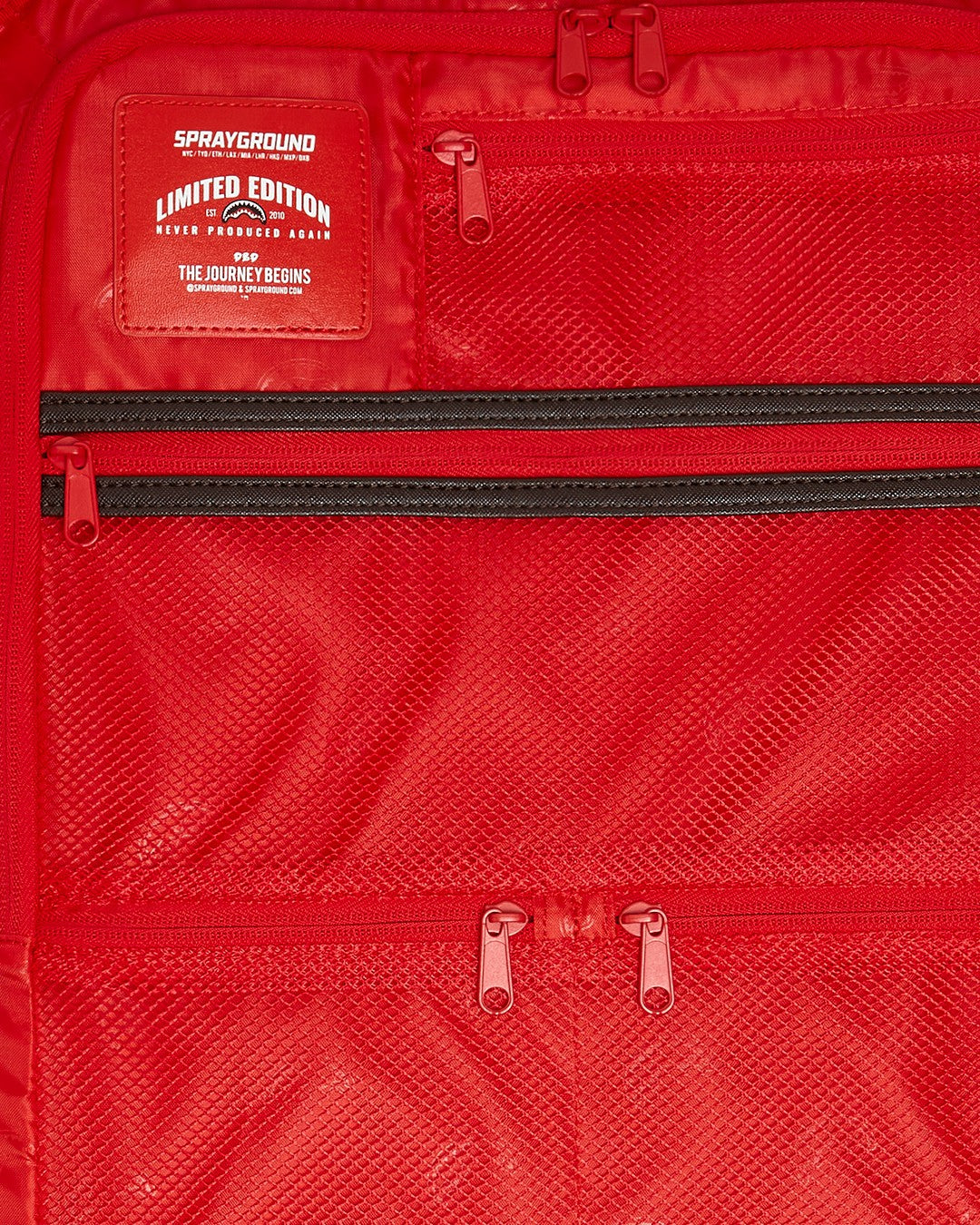 EXTERIOR GOLD ZIP POCKET SHARKS IN PARIS JETSETTER CARRY-ON LUGGAGE | Sprayground Discount