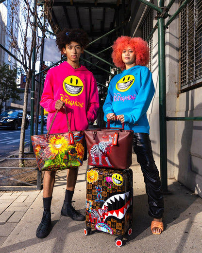 GLOBAL MOGUL POPAGANDA RON ENGLISH EDITION HARDSHELL CARRY-ON LUGGAGE | Sprayground Online
