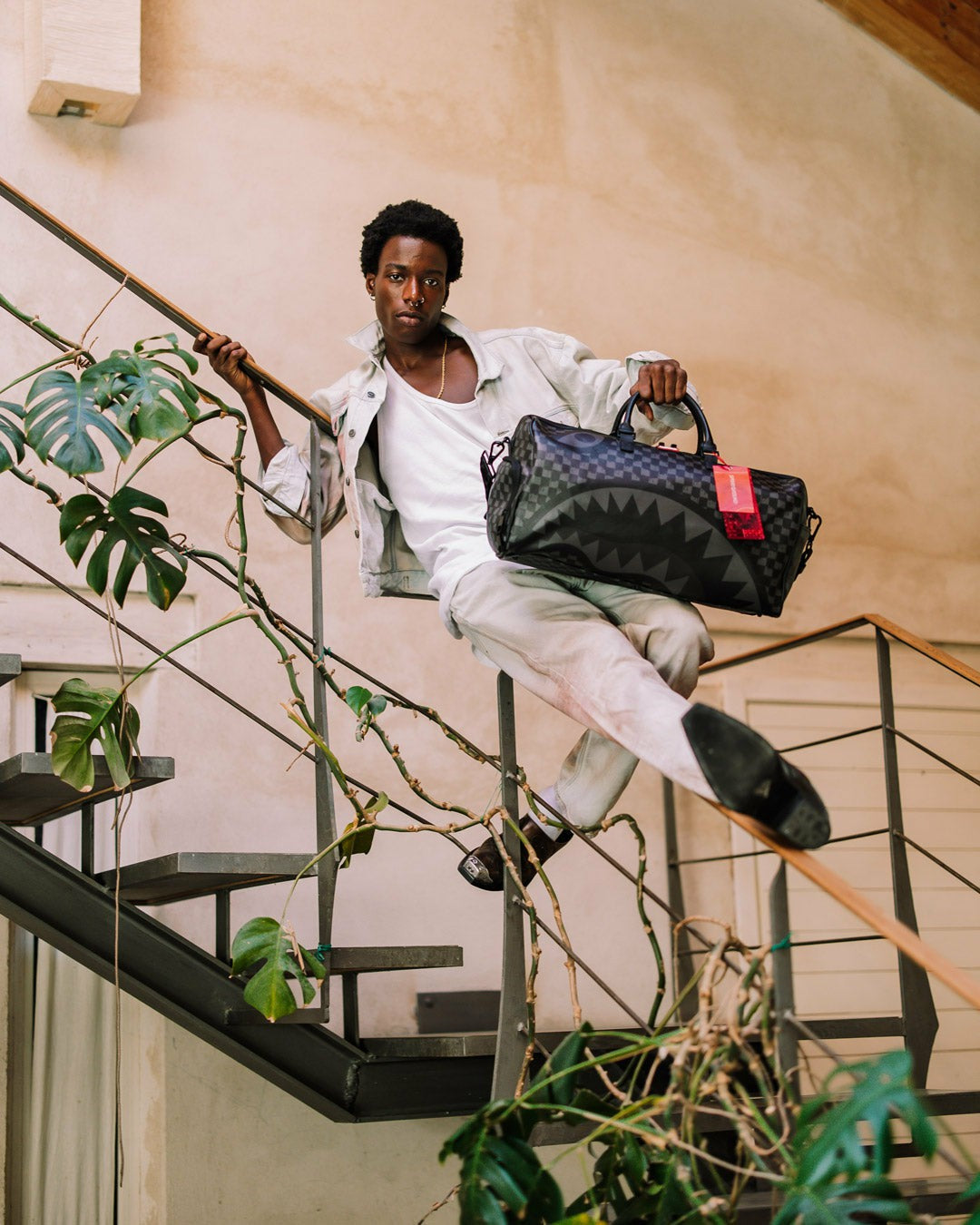 HANGOVER DRIP CHECK DUFFLE | Sprayground US