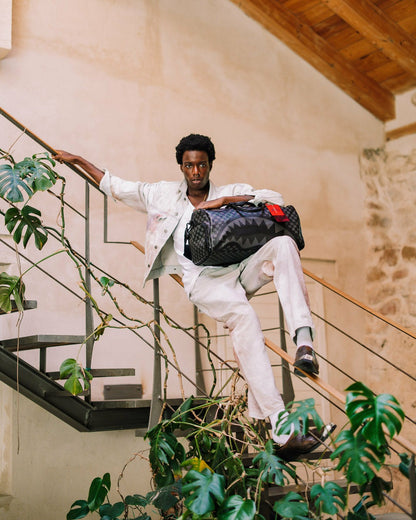 HANGOVER DRIP CHECK DUFFLE | Sprayground US
