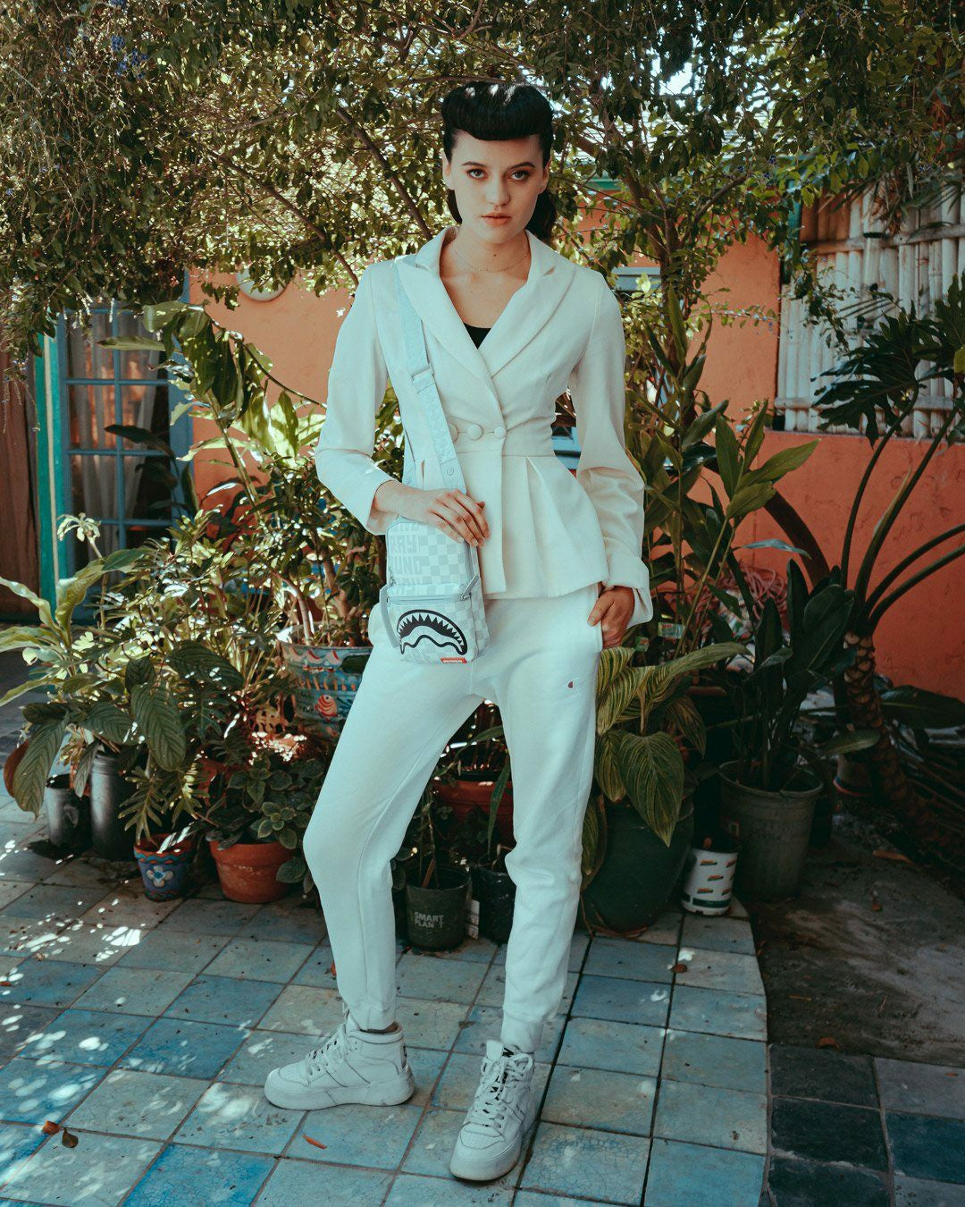 SPLIT THE CHECK (PEARL) SLING | Sprayground US