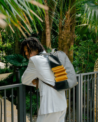 A.i.3 SHARK BITE BLACK GOLD BACKPACK (DLXV) | Sprayground for sale