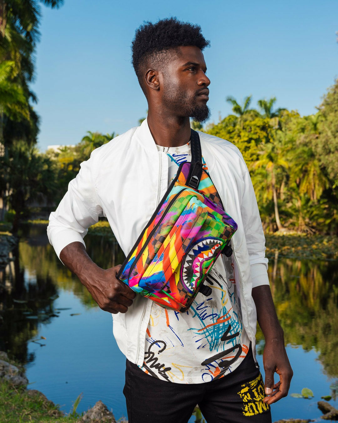 SHARKS IN PARIS CITY STREAKS CARGO CROSSBODY | Sprayground for sale