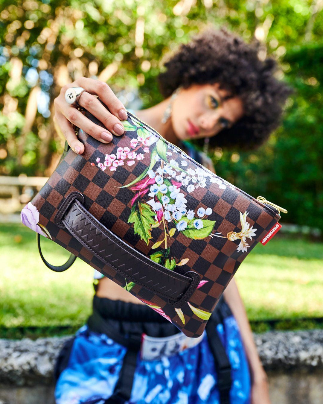 GARDEN OF SHARKS CROSSOVER CLUTCH | Sprayground Discount