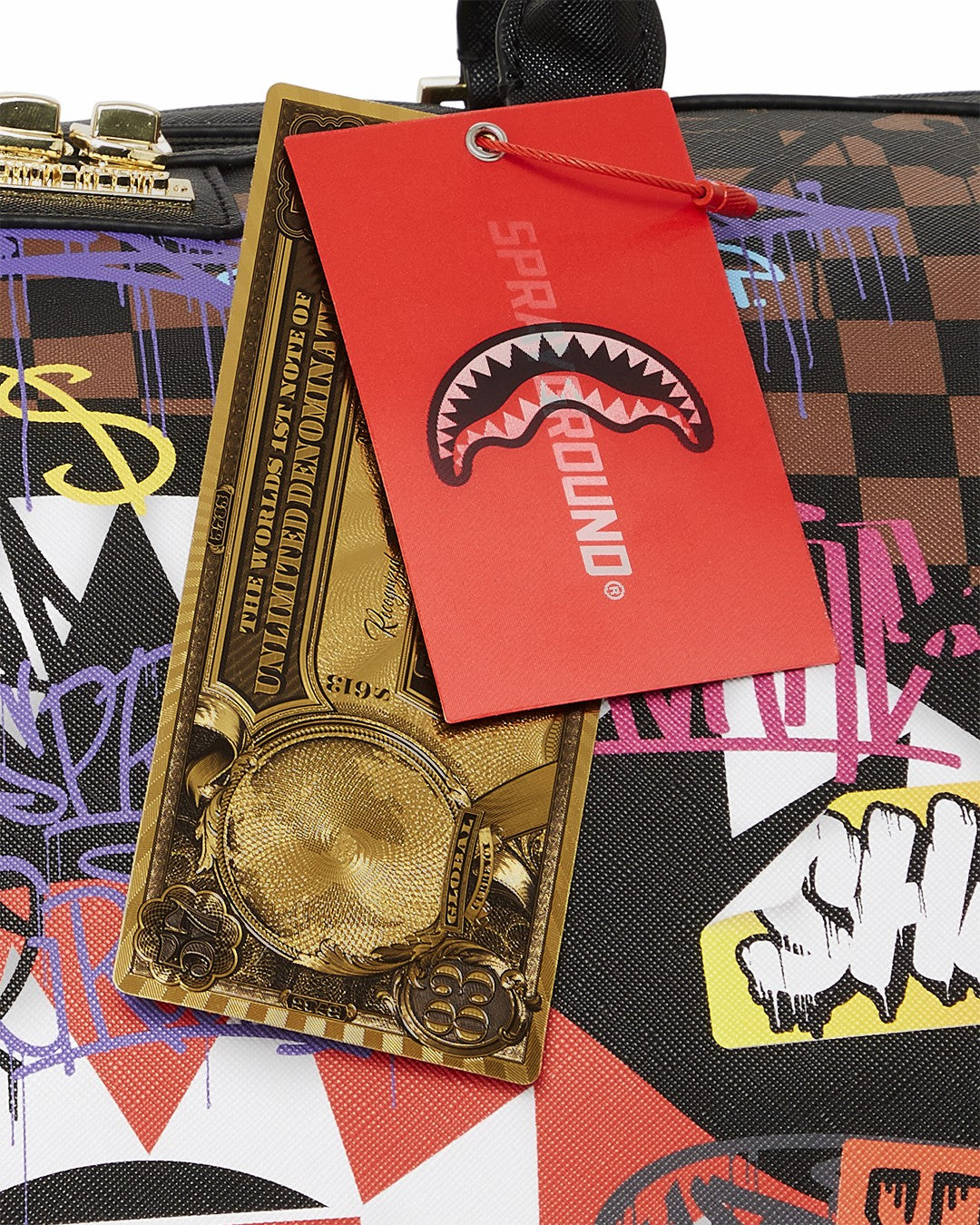 SHARKS IN PARIS THE RIZZ DUFFLE | Sprayground Near Me