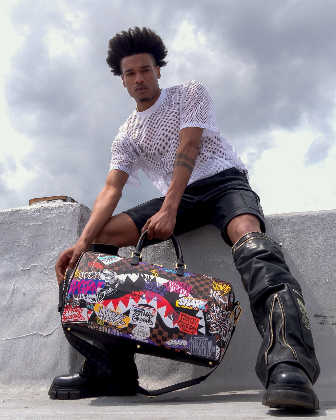 SHARKS IN PARIS THE RIZZ DUFFLE | Sprayground Near Me