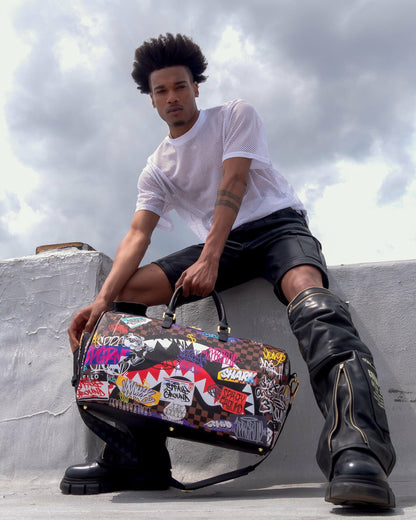 SHARKS IN PARIS THE RIZZ DUFFLE | Sprayground Near Me