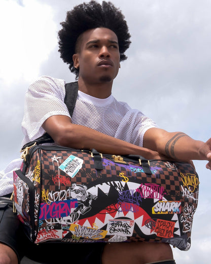 SHARKS IN PARIS THE RIZZ DUFFLE | Sprayground Near Me