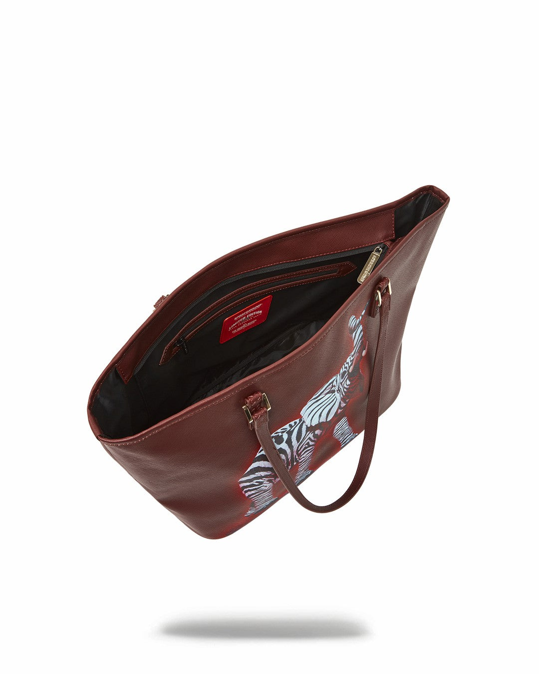 ZEBRA ELEPHANT RON ENGLISH COLLAB TOTE | Sprayground Near Me
