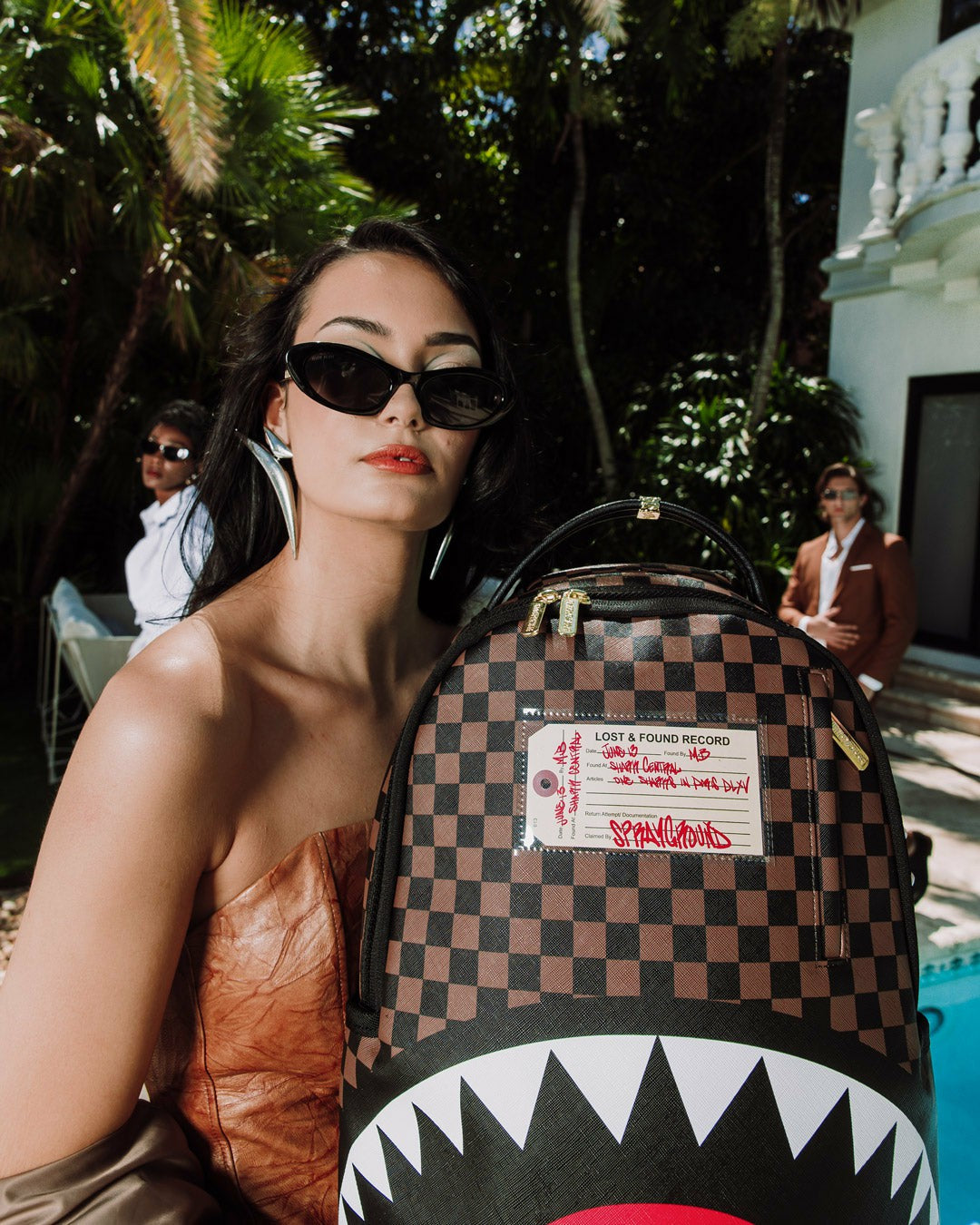 SHARKS IN PARIS LOST & FOUND BACKPACK | Sprayground US