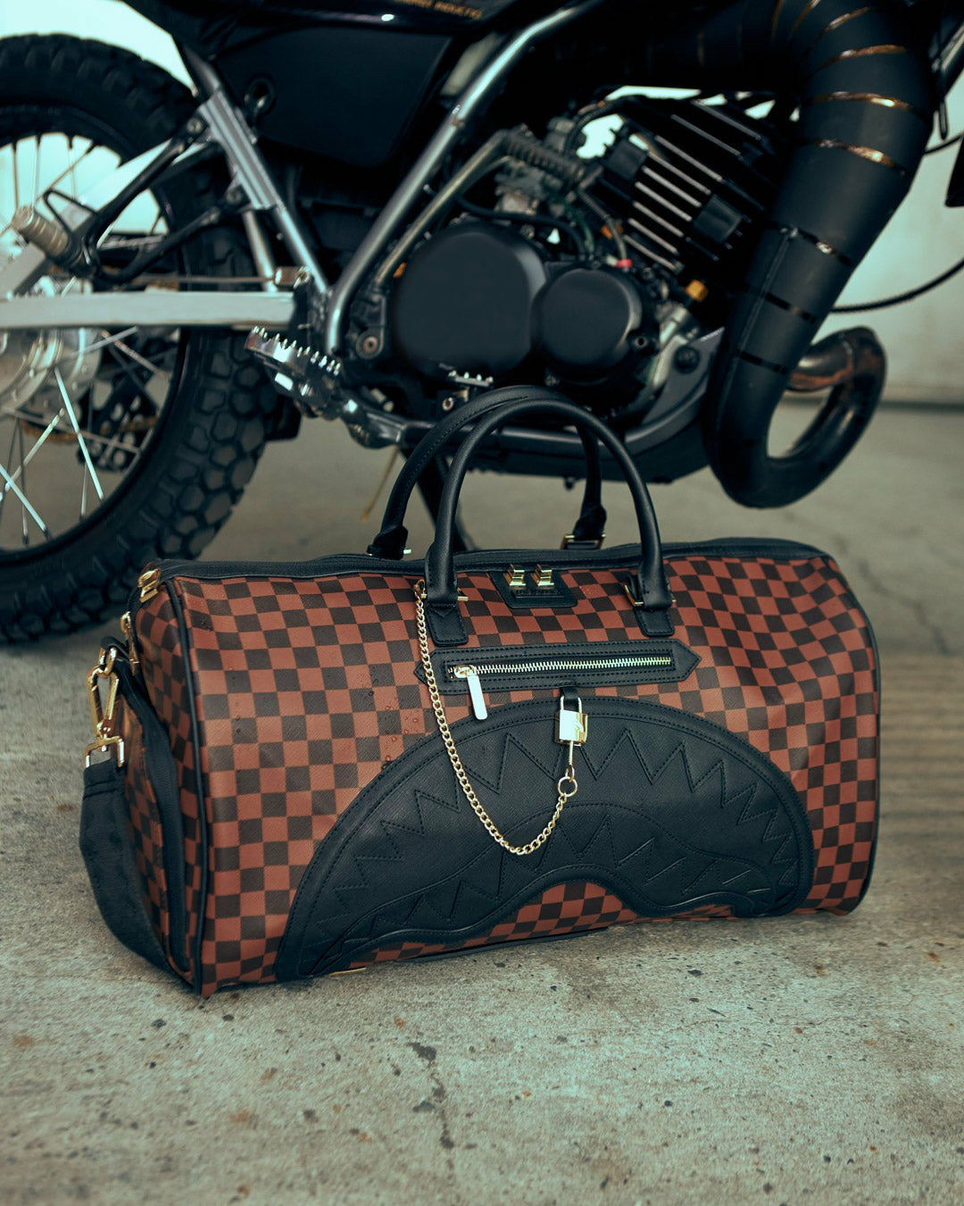 HENNY LOCK SHARKS IN PARIS DUFFLE | Sprayground US