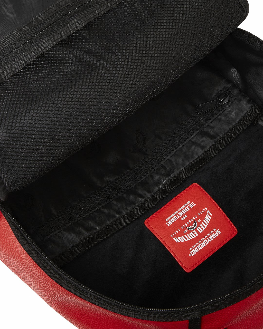 SHARK CENTRAL EMBOSSED DRIP DLXSV BACKPACK | Sprayground Near Me