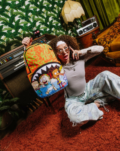 RUGRATS SHOWTIME DLXR BACKPACK | Sprayground Near Me