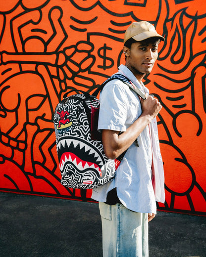 KEITH HARING SKATER SHARK DLXSR BACKPACK | Sprayground Clearance